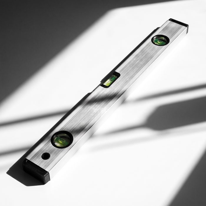 1 metre aluminium spirit level ruler on a white background
